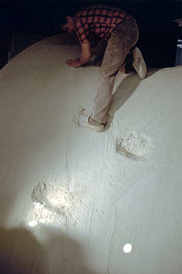 Lucien den Arend working on the plaster model for a bronze sculpture for the Amsterdam-North Police Station