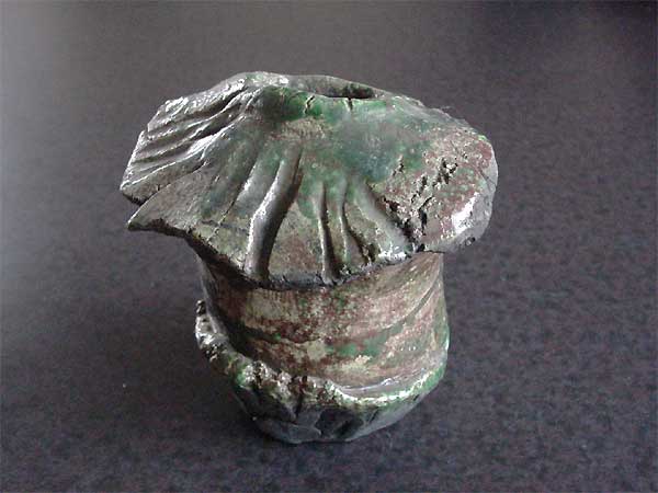 raku slab pot with lead glaze and copper oxide - reduced