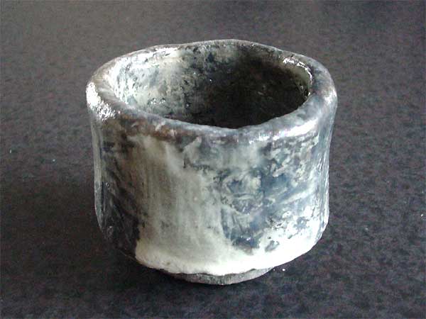 raku tea bowl zircon glaze - reduced