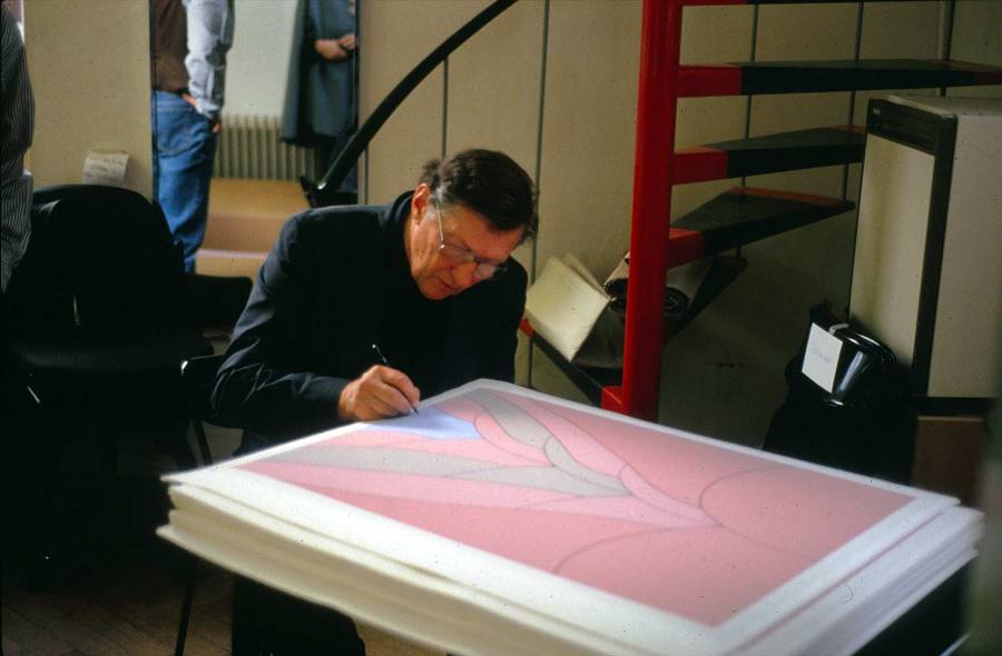 John Wesley signing the first print "getting off the subway at St. Tropez"..