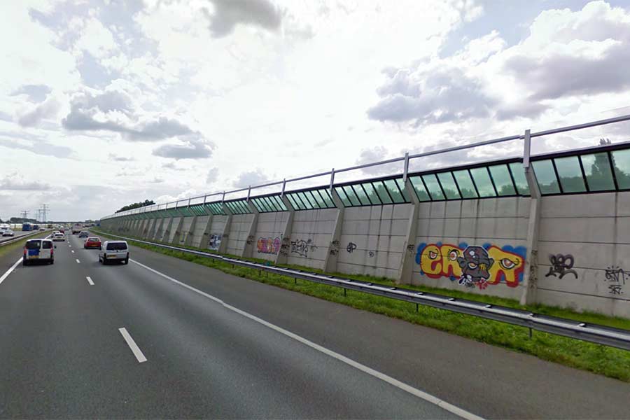 Present day concrete noise barriers (seen from road level).