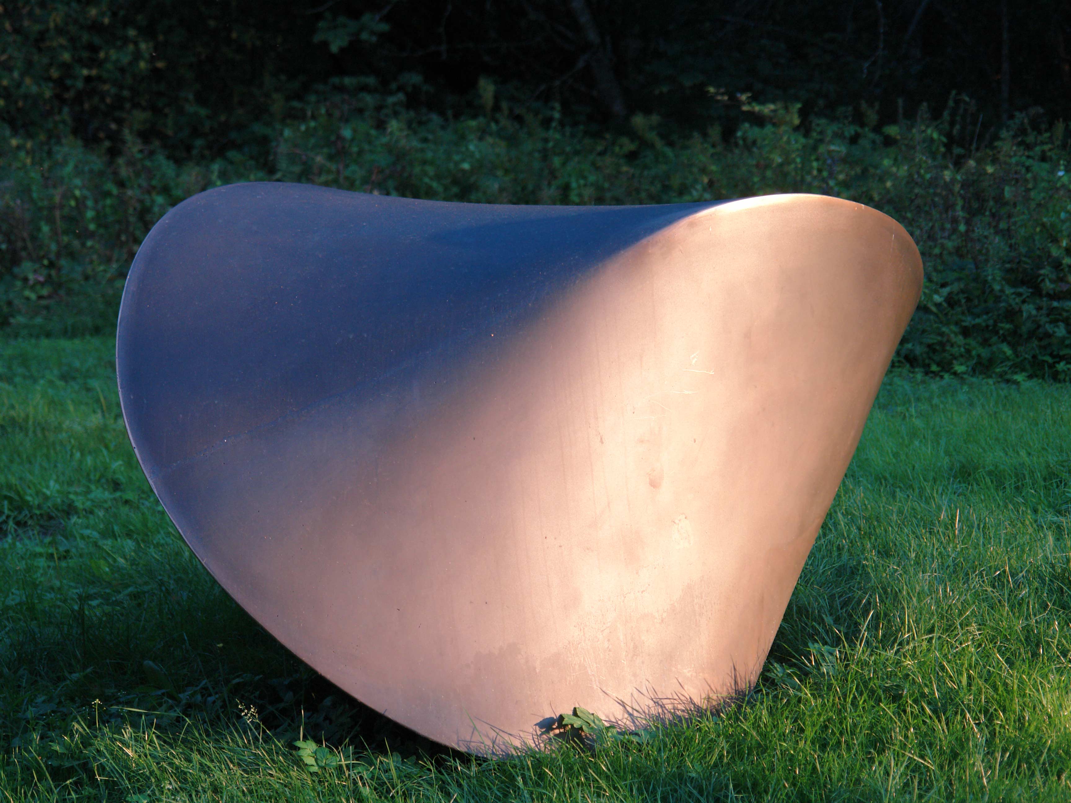 bronze sculpture , bidiscoid monoplane