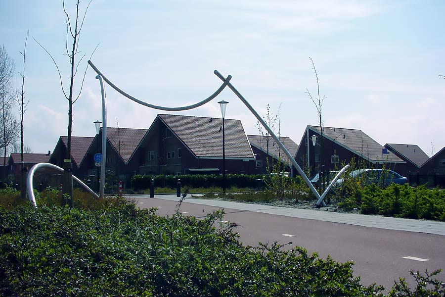 Arcadia - the stainless steels culpture traverses the bicycle route - a site specific sculpture in Heerhugowaard NL.