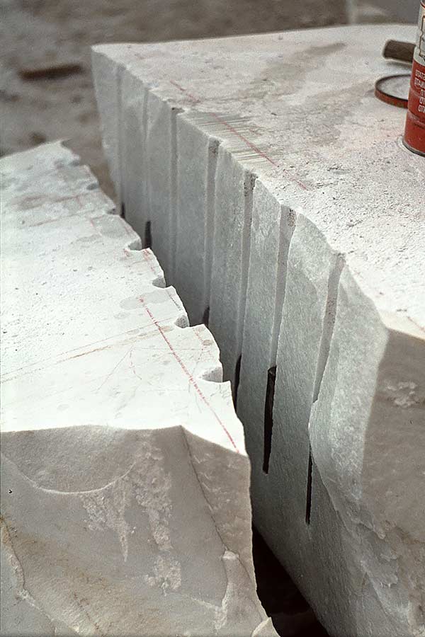 Measuring for Bianco Carrara piece - perpendicular cylinders III at Angeli Brothers in Querceta.