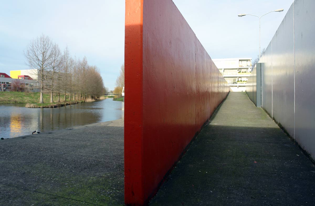 Walls in urban land art define an urban oasis in Ede, the Netherlands.
