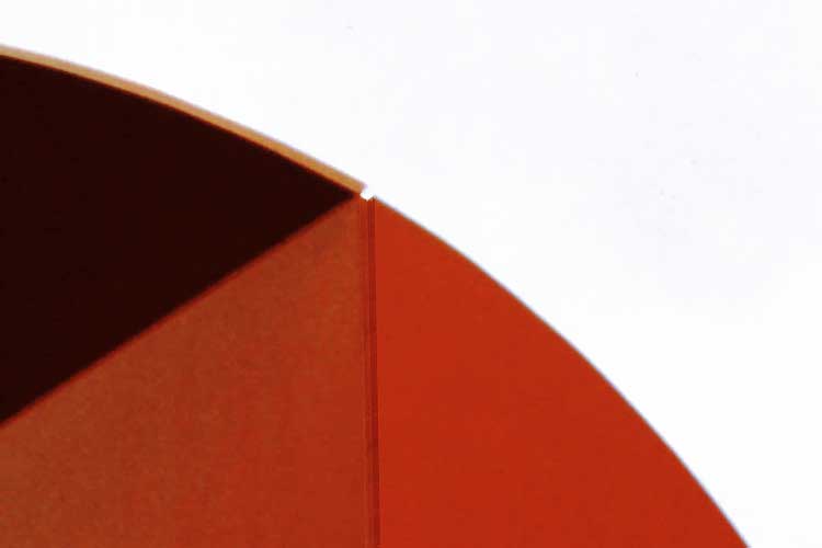 detail of red, mild steel, sculpture - 40mm thick sheet